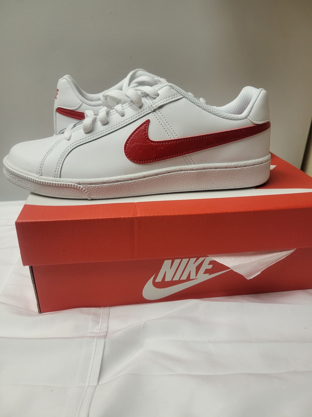 Nike White Sneakers with Red Swoosh